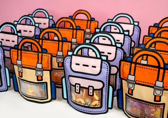 Traktatiezakje Schooltas Roze lila